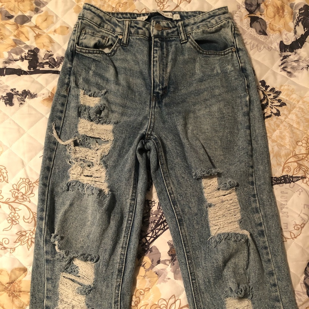 Light washed jeans with distressed